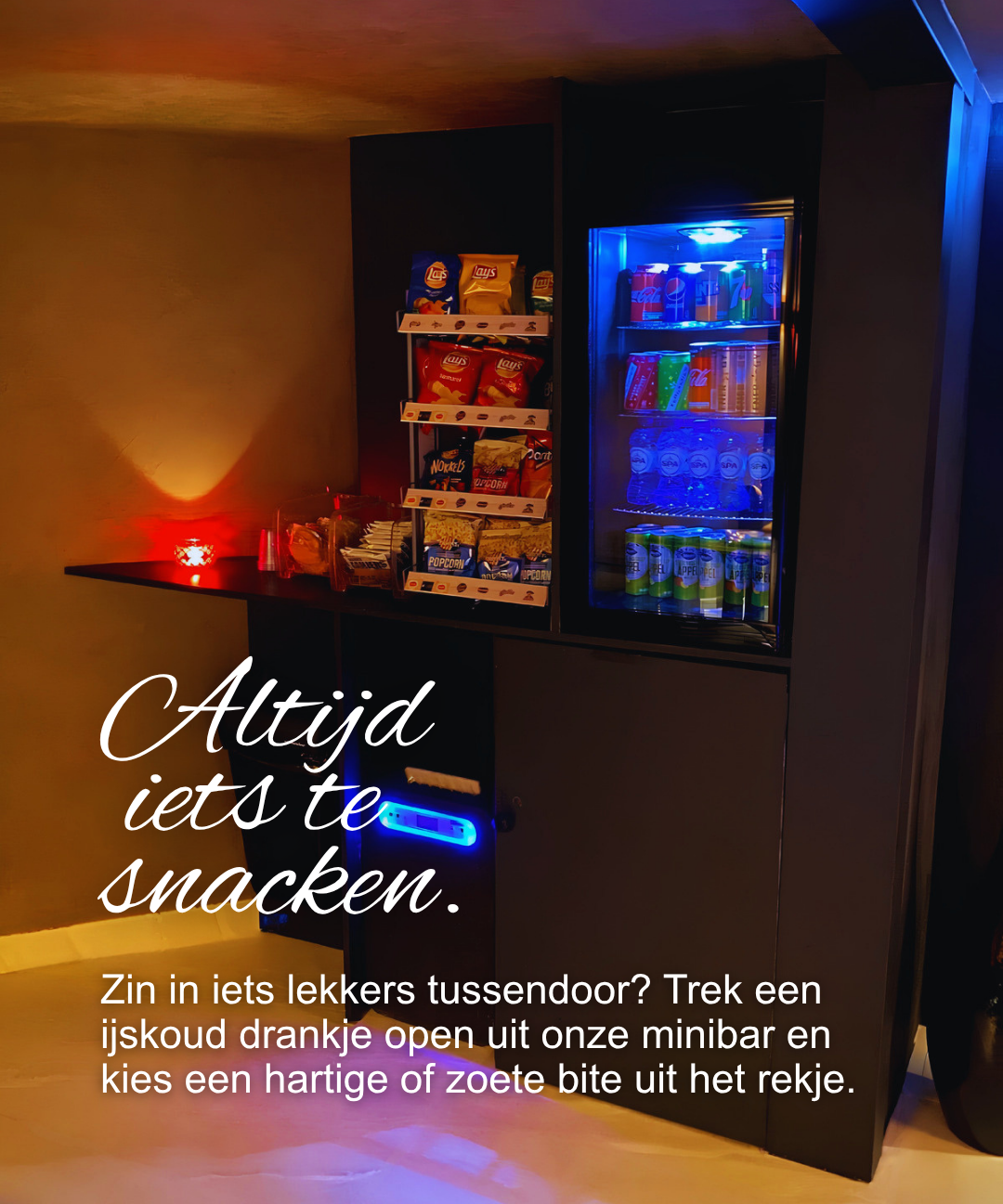 Een rijkgevulde minibar met gekoelde dranken en snacks tijdens uw verblijf bij Bella Vita Zoetermeer.